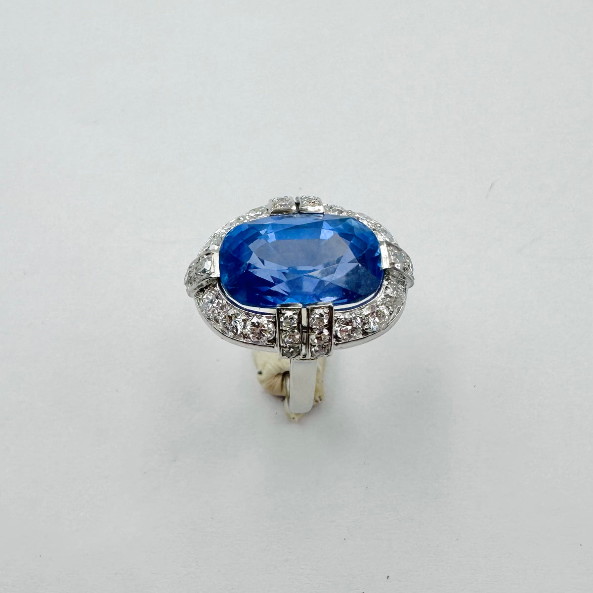 Entourage Ring in platinum, sapphire, and diamonds