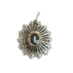 White gold, sapphire, and diamond pendant