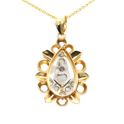 Pendant made of white gold, yellow gold, and diamonds