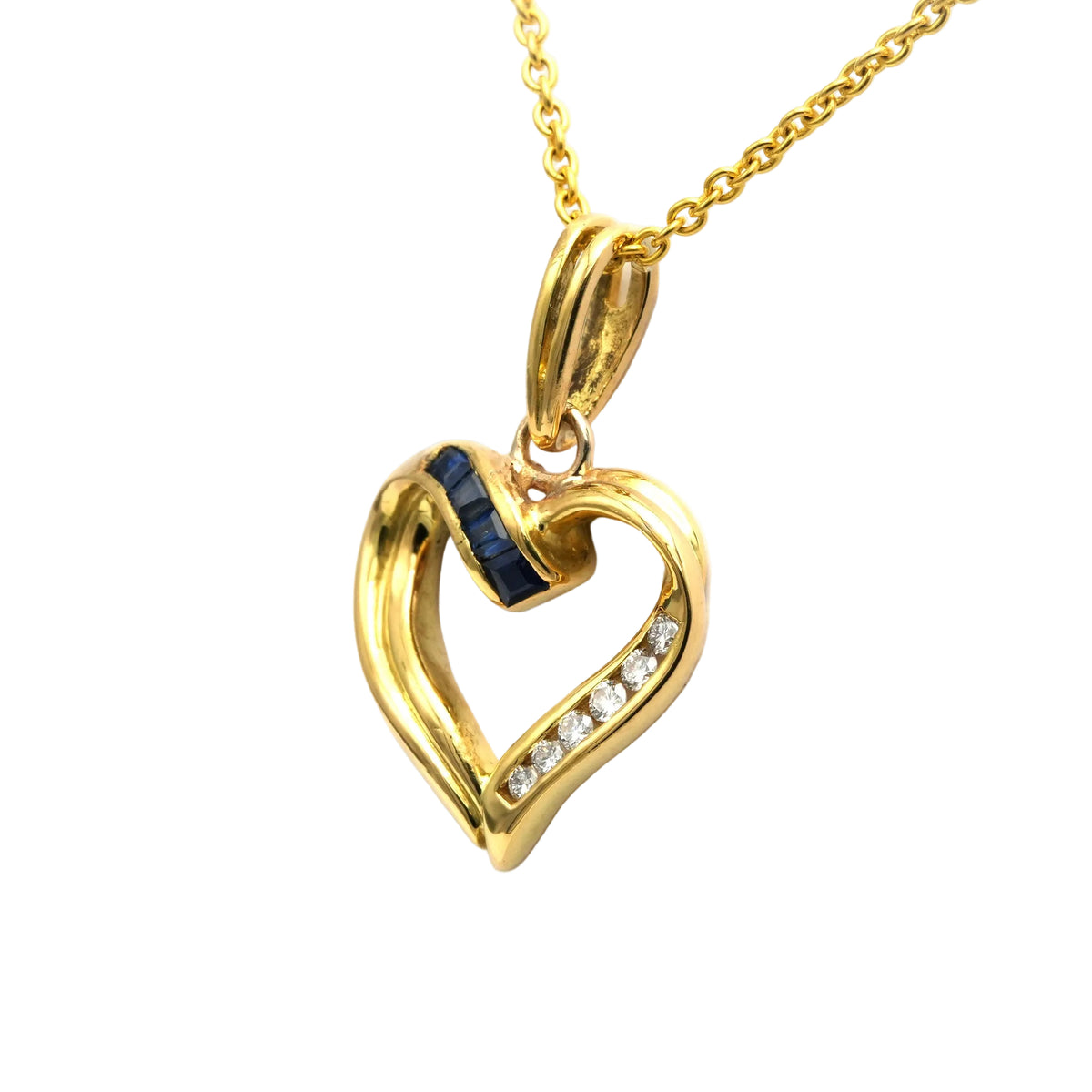Yellow gold pendant with sapphires and diamonds
