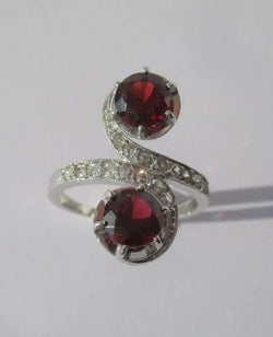 "Toi et Moi" Ring with 19th-Century Swirls, Garnets, Diamonds, and Platinum