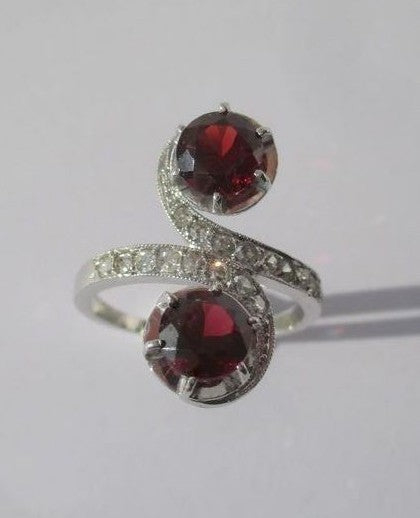 "Toi et Moi" Ring with 19th-Century Swirls, Garnets, Diamonds, and Platinum