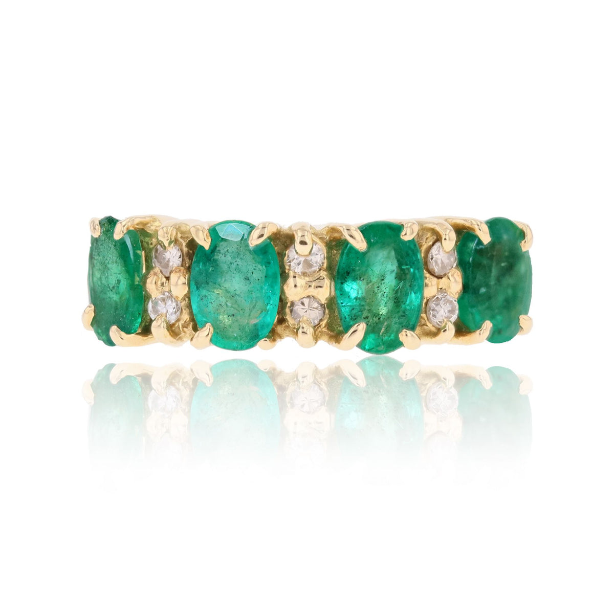Bague Jarretière en or jaune, émeraudes et diaamnts