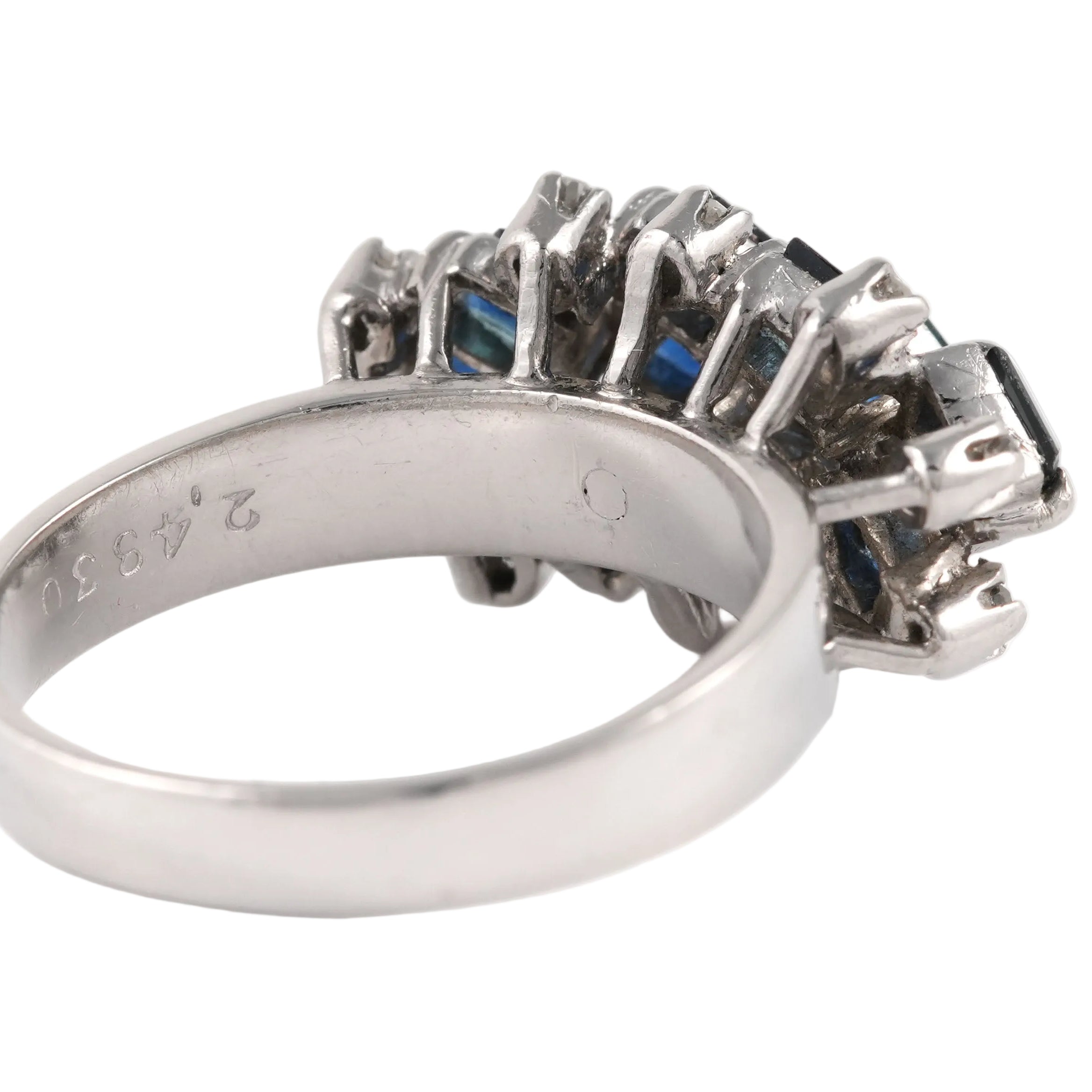 White gold ring with sapphires and diamonds