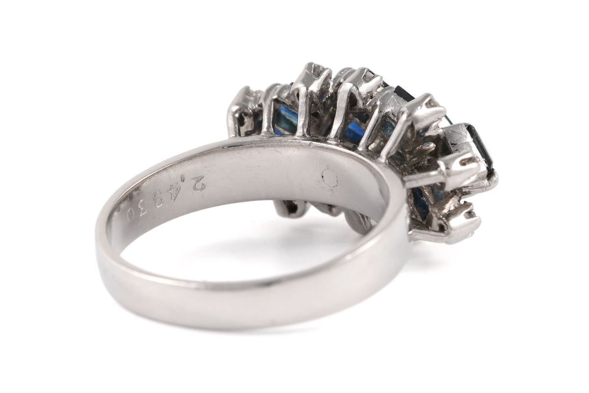 White gold ring with sapphires and diamonds