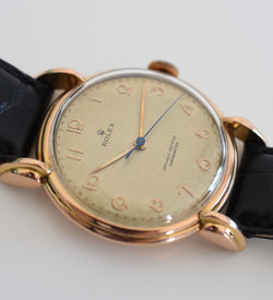 ROLEX "Chronometer" watch in rose gold, steel, and leather