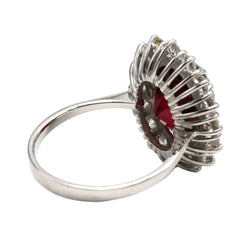 Entourage Ring in white gold, rubies, and diamonds
