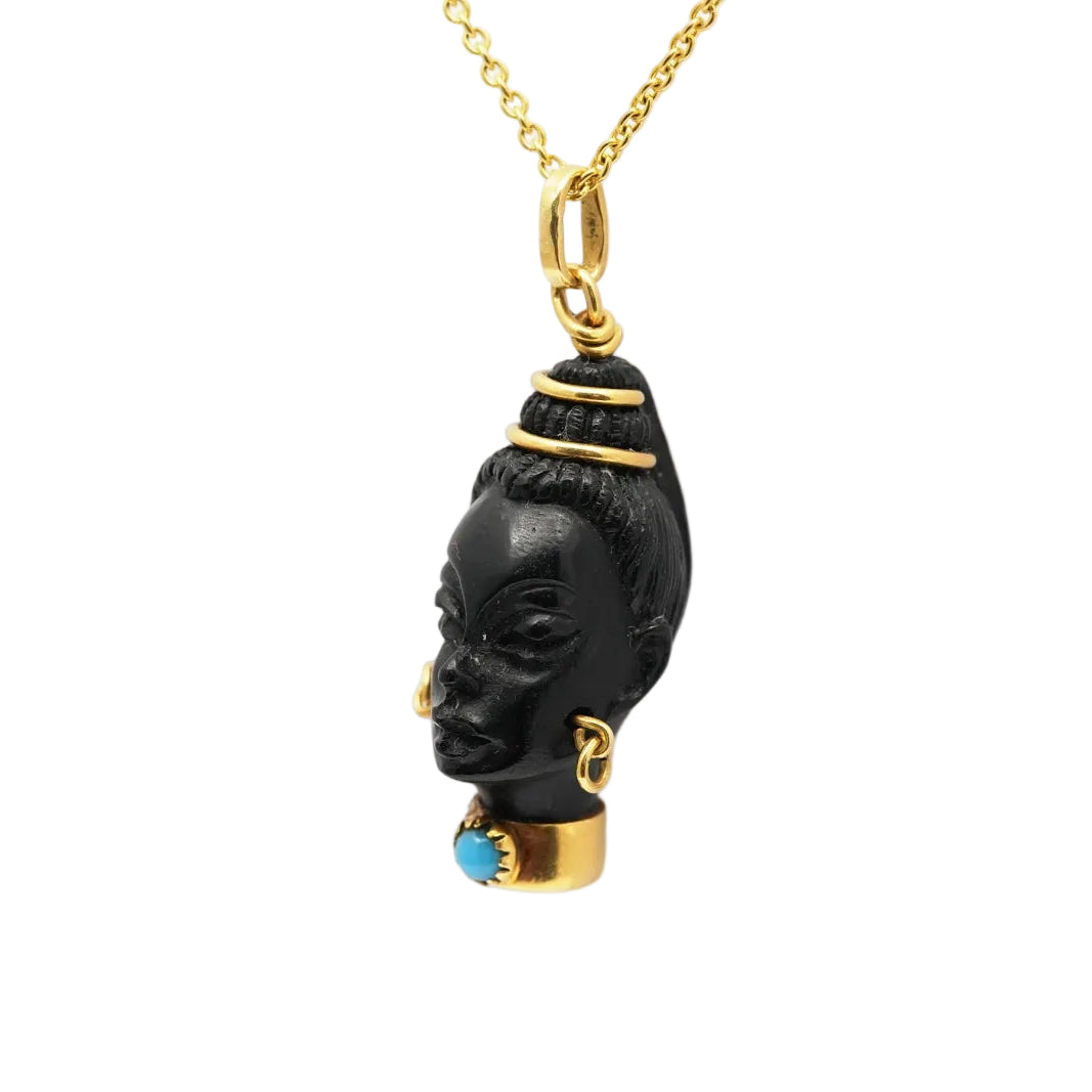 Yellow gold, ebony, and turquoise pendant
