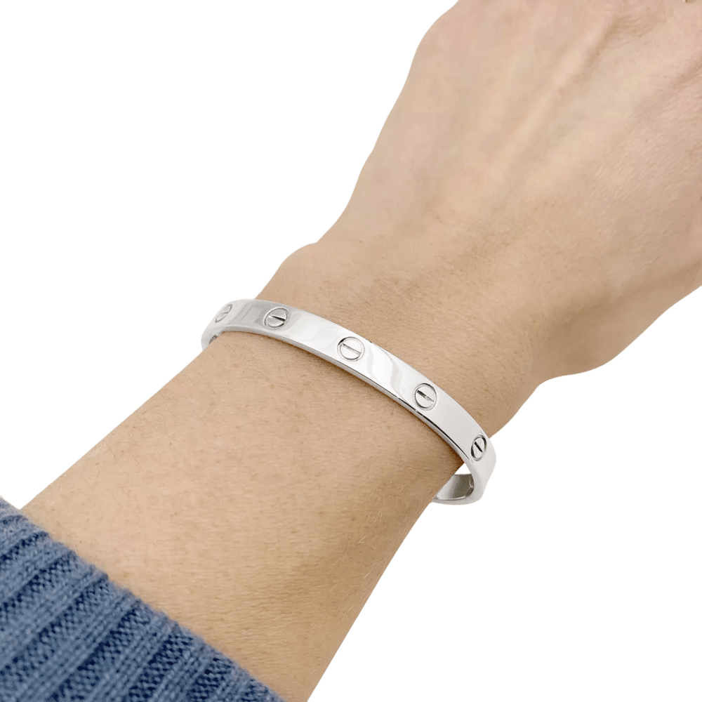 Bracelet Cartier "Love" or blanc.