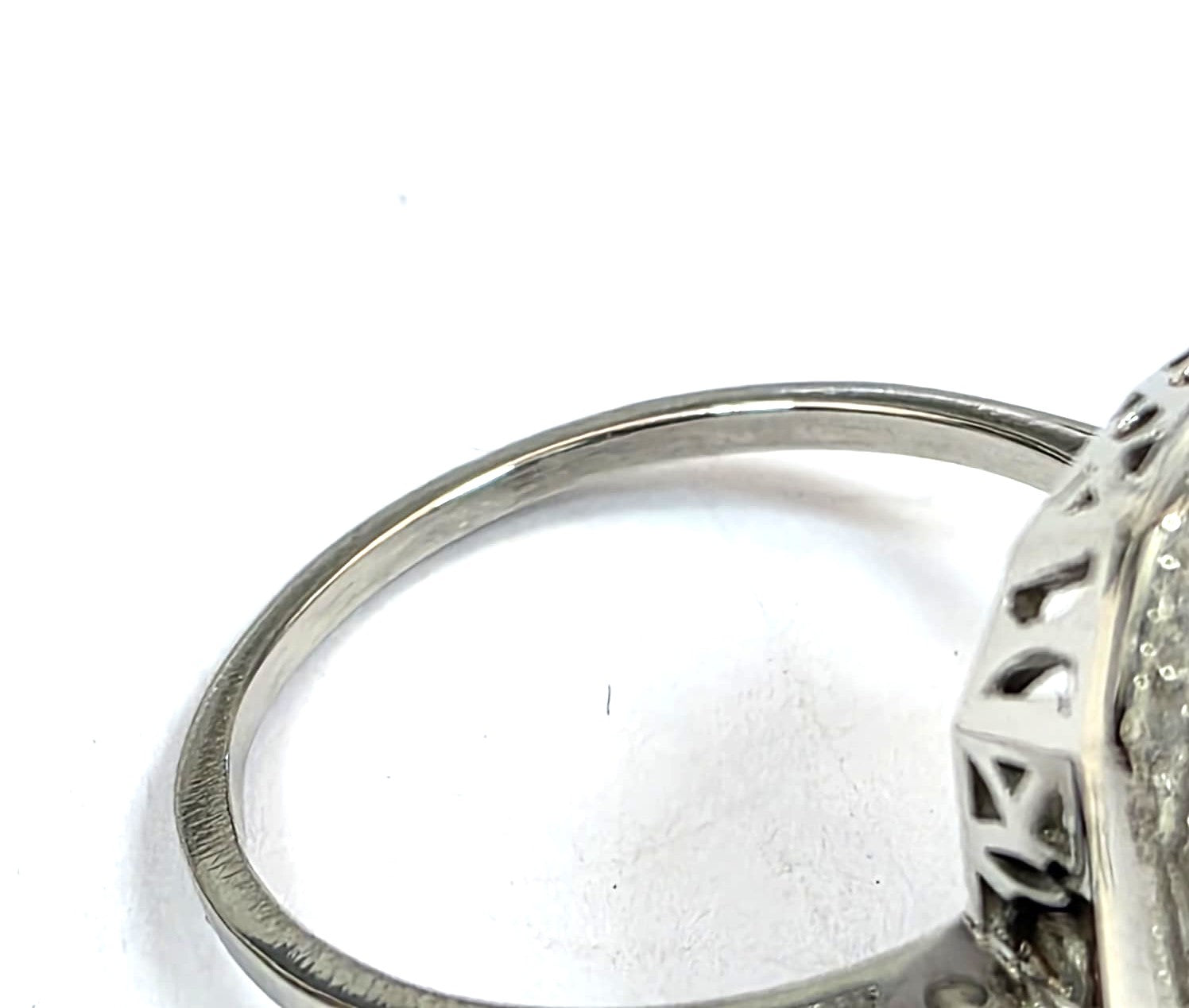 "Entourage" Ring in White Gold, Sapphire, and Diamonds