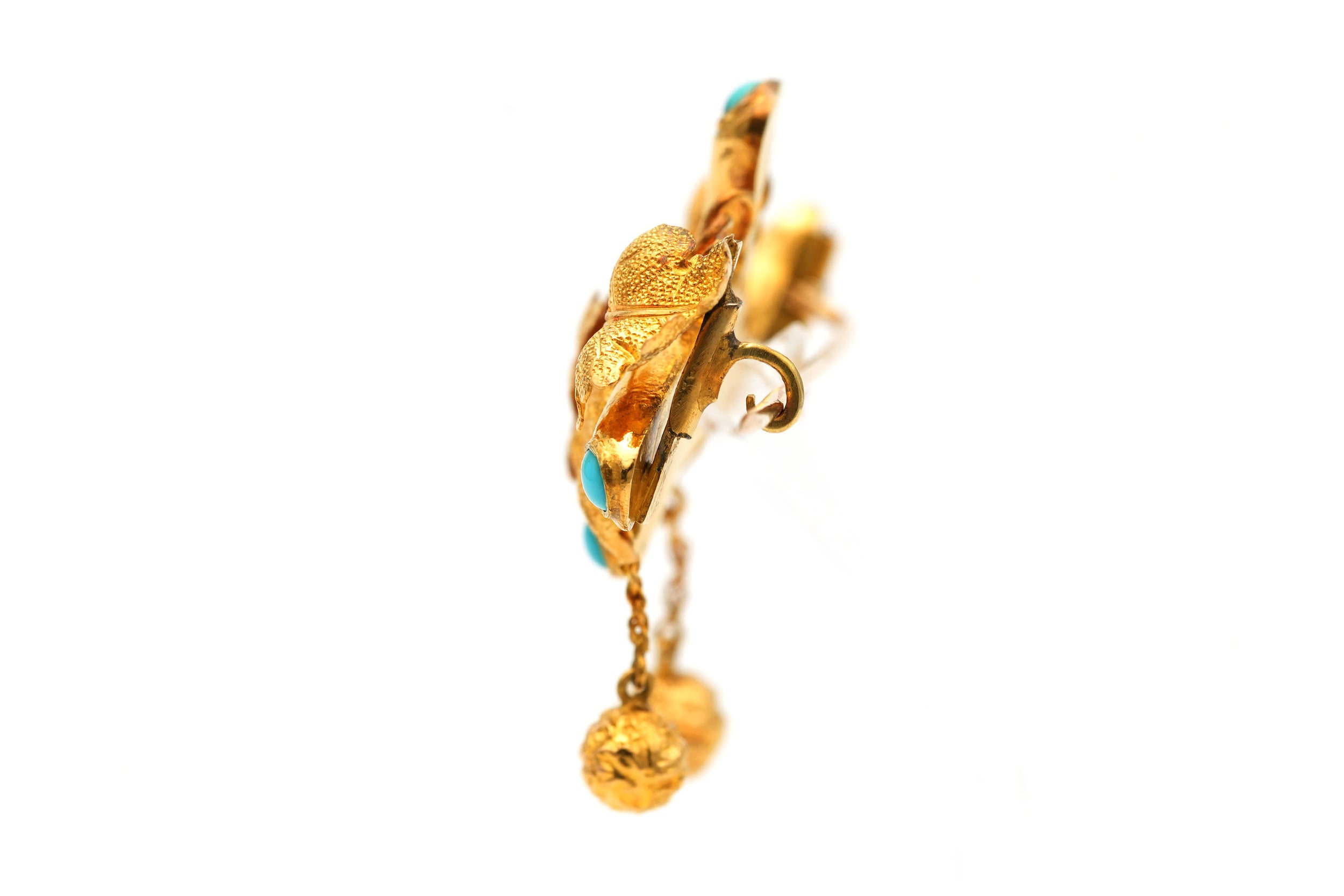 Broche Épingle en or jaune et turquoises