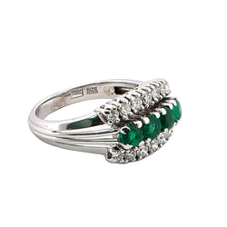 White gold ring with emeralds and diamonds
