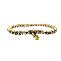 "Ligne" Bracelet in White Gold, Yellow Gold, Sapphires, and Diamonds