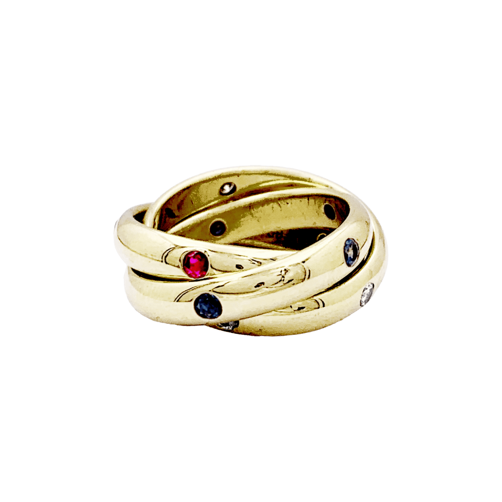 Bague Cartier, "Constellation", or jaune, saphirs, rubis, diamants.