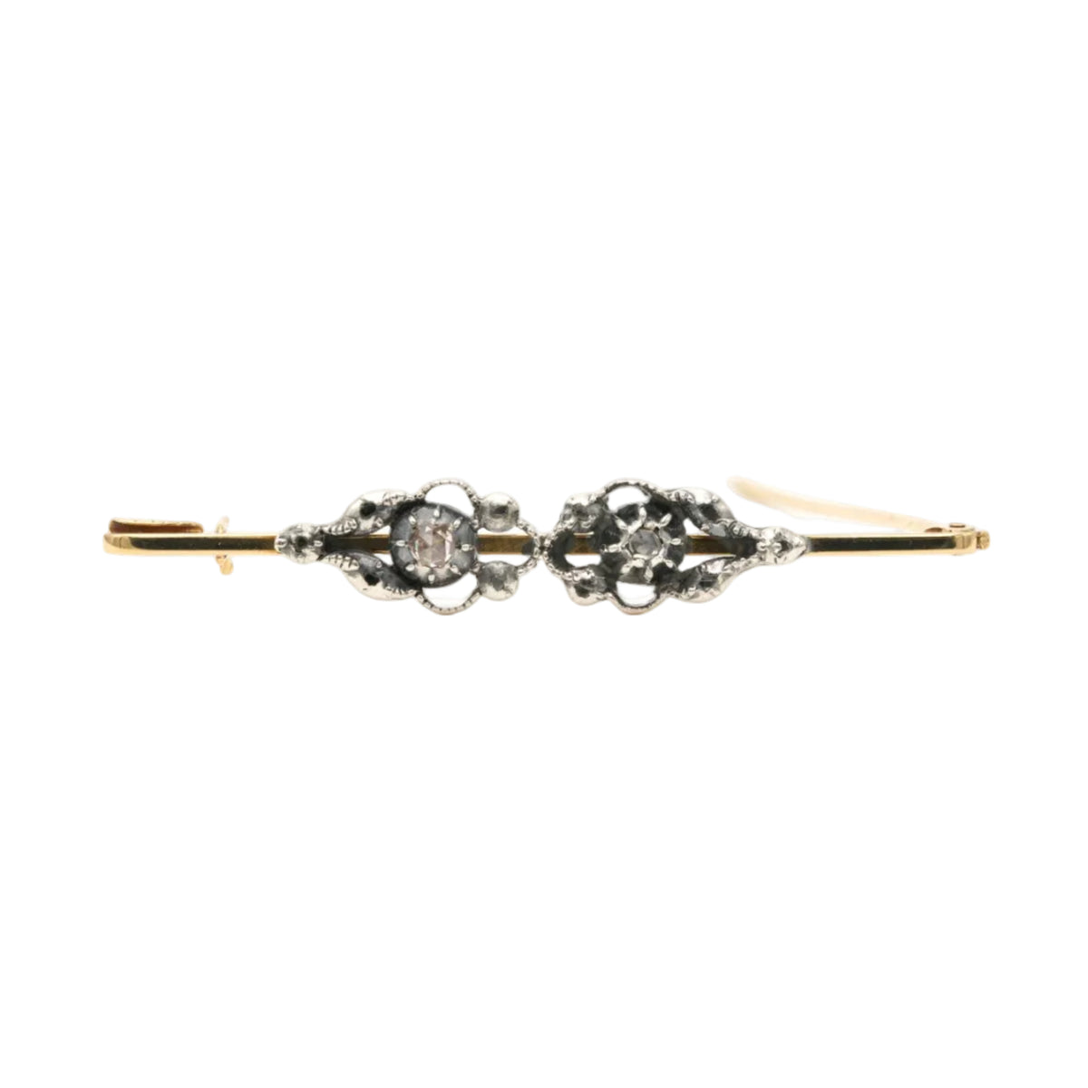 Brooch made of yellow gold, silver, and diamonds