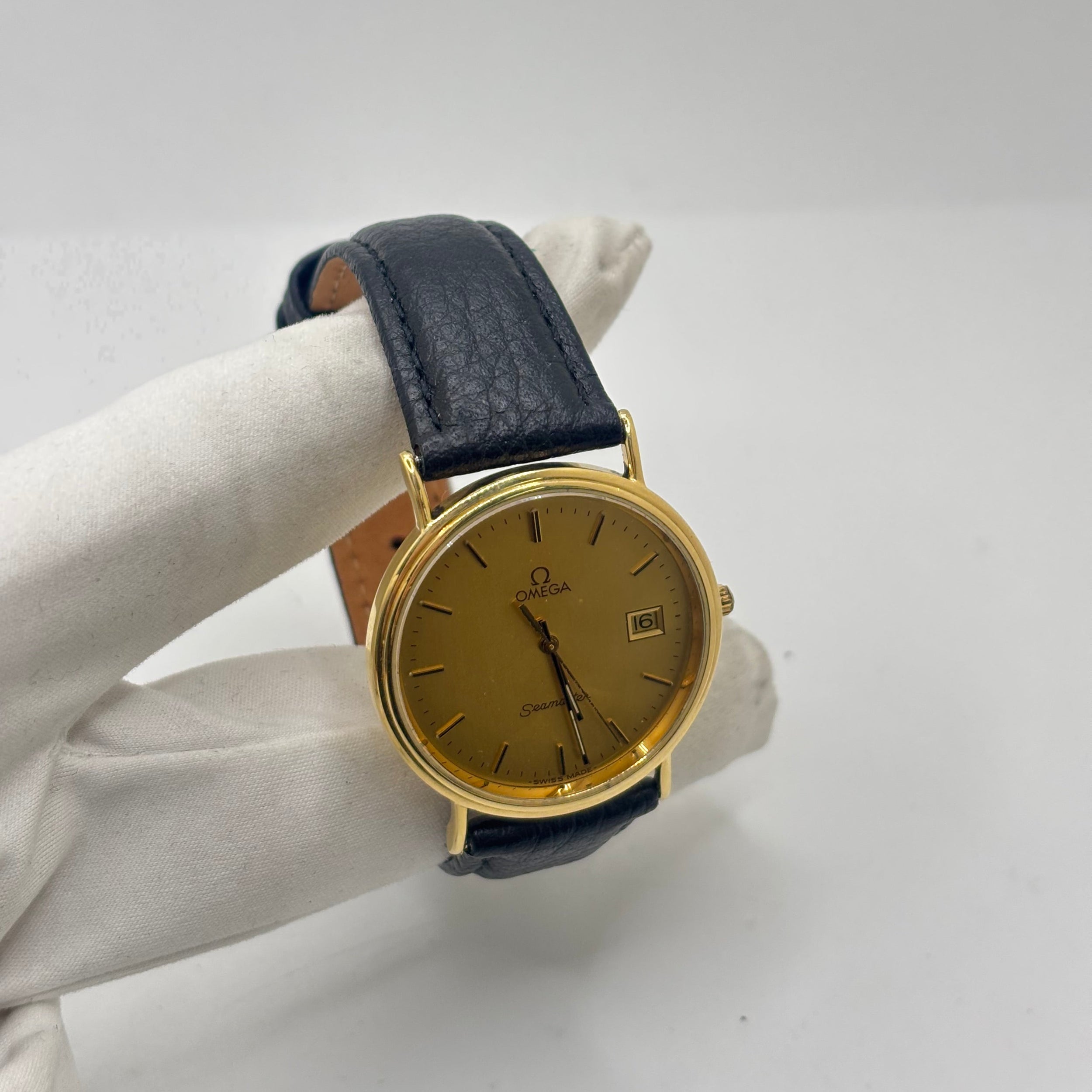 OMEGA "Seamaster" Watch in Yellow gold and Leather