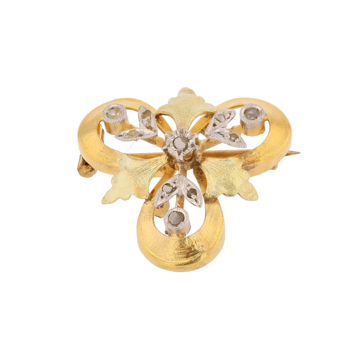 Brooch in white gold, yellow gold, green gold, and diamonds