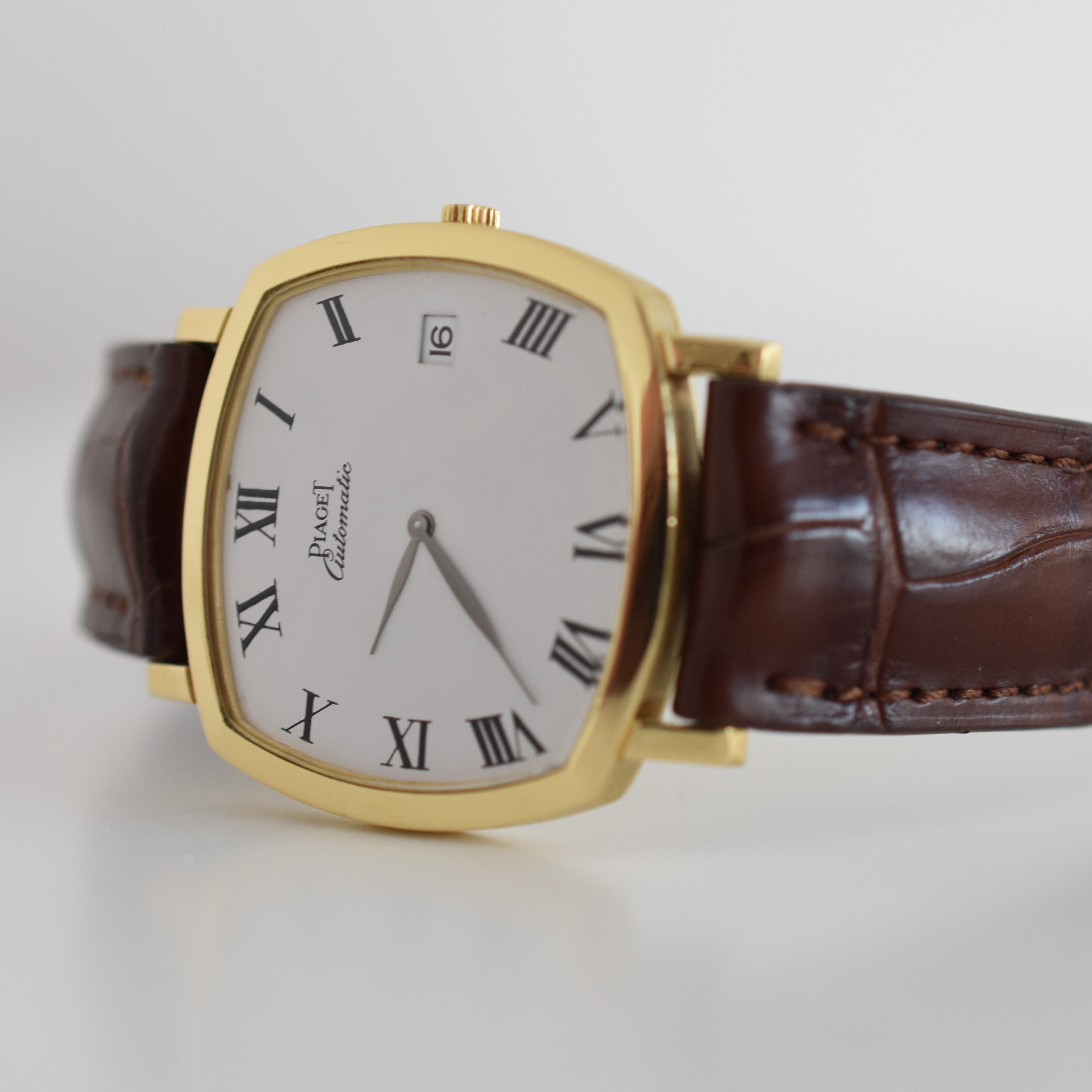 Montre PIAGET Coussin en or jaune et cuir