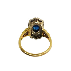 Ring in white gold, yellow gold, sapphires, and diamonds