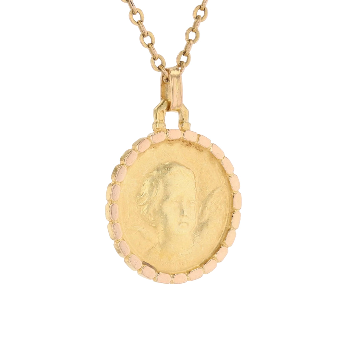 Medal in yellow gold and rose gold