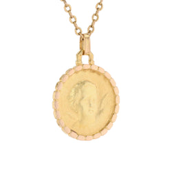 Medal in yellow gold and rose gold