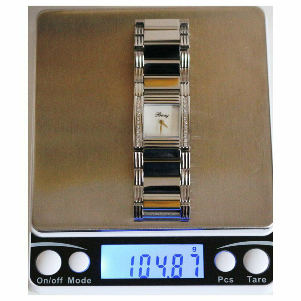 POIRAY "Ma Première Cuff Bracelet" watch in stainless steel, Mother-of-pearl, Quartz, and Diamonds