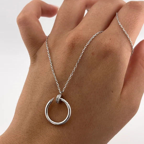 CARTIER "Just un Clou" Pendant Necklace in white gold and diamonds