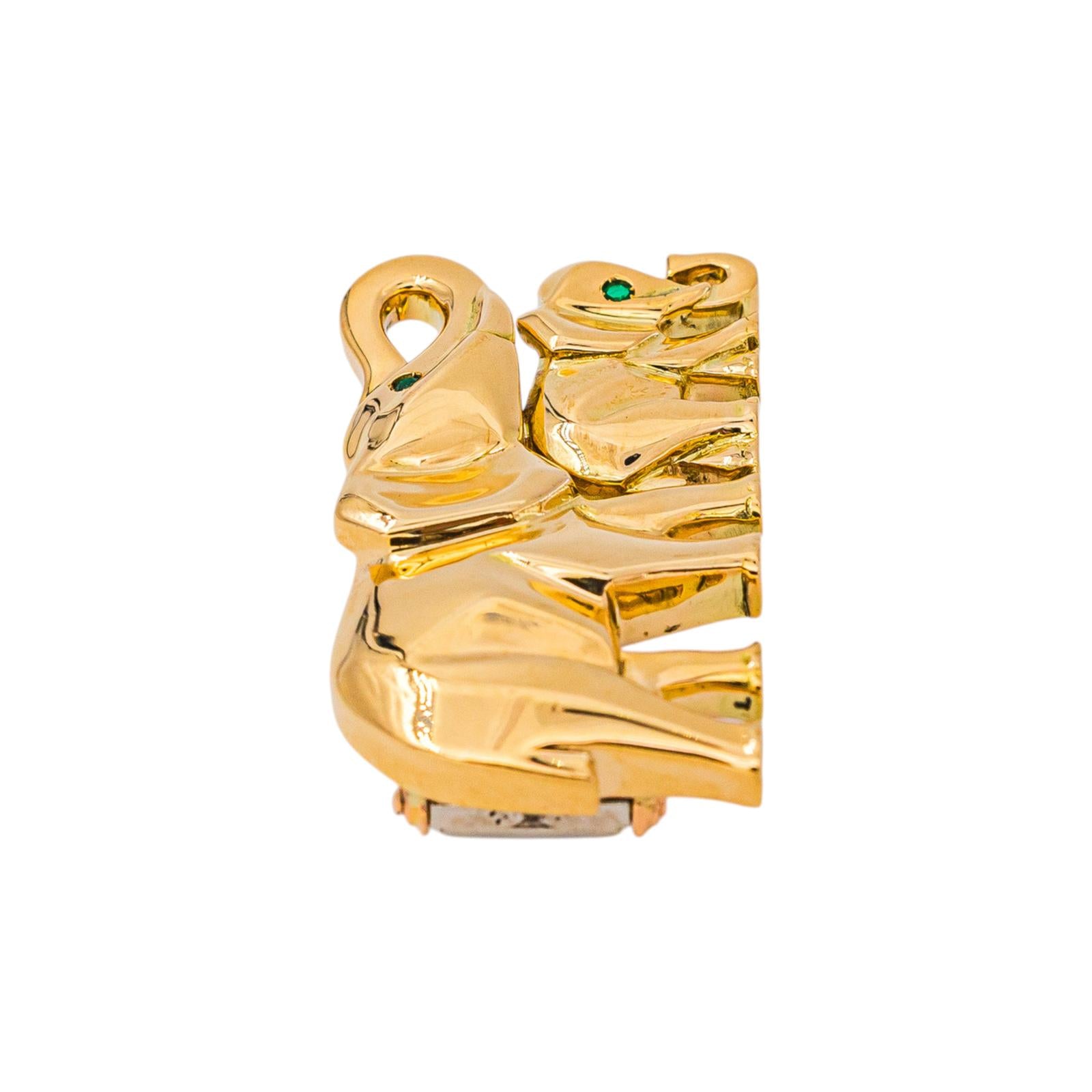 Cartier "Route des Indes" Brooch, Yellow gold with Emerald