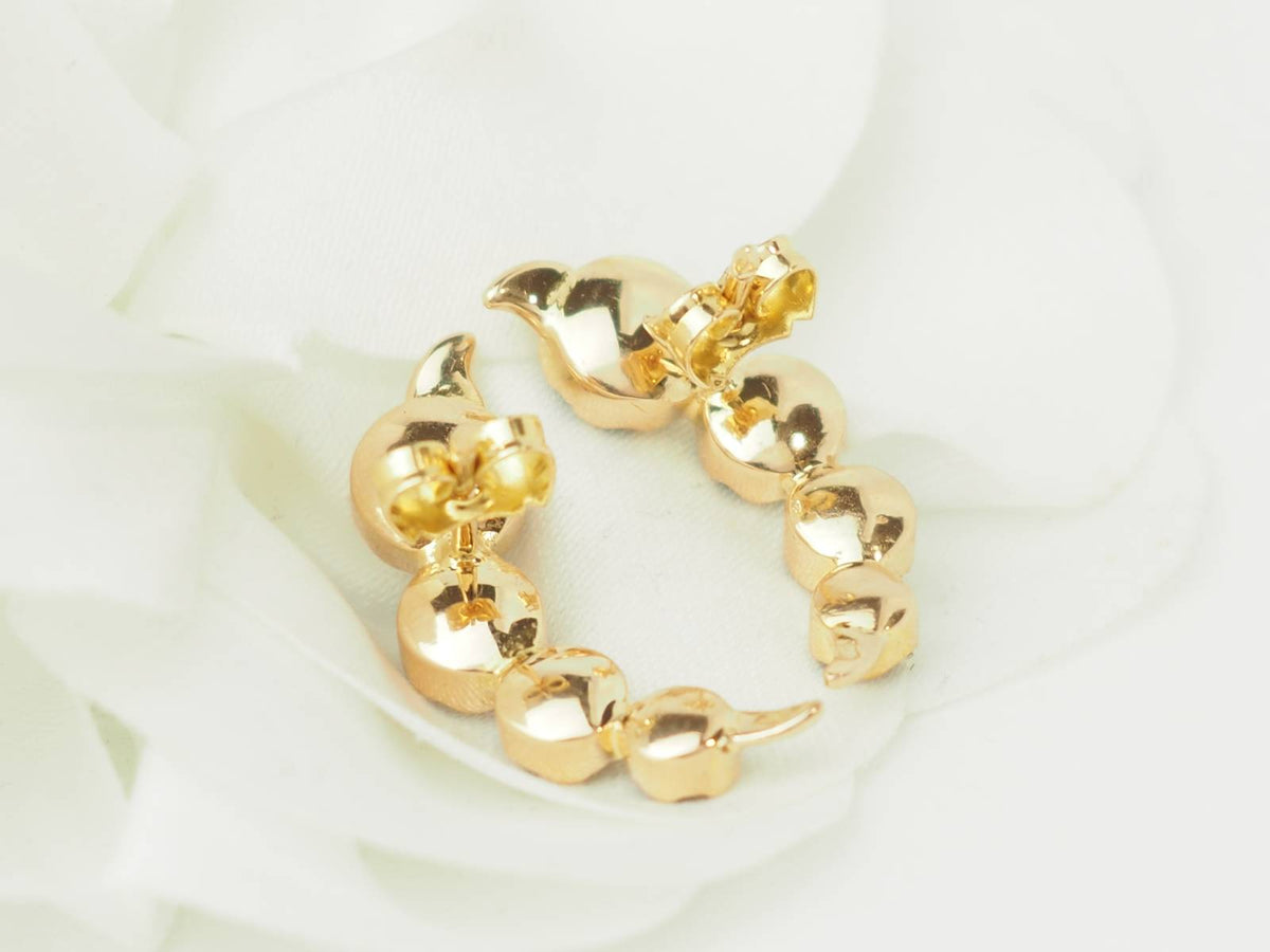 Boucles d’oreilles en or jaune et grenats