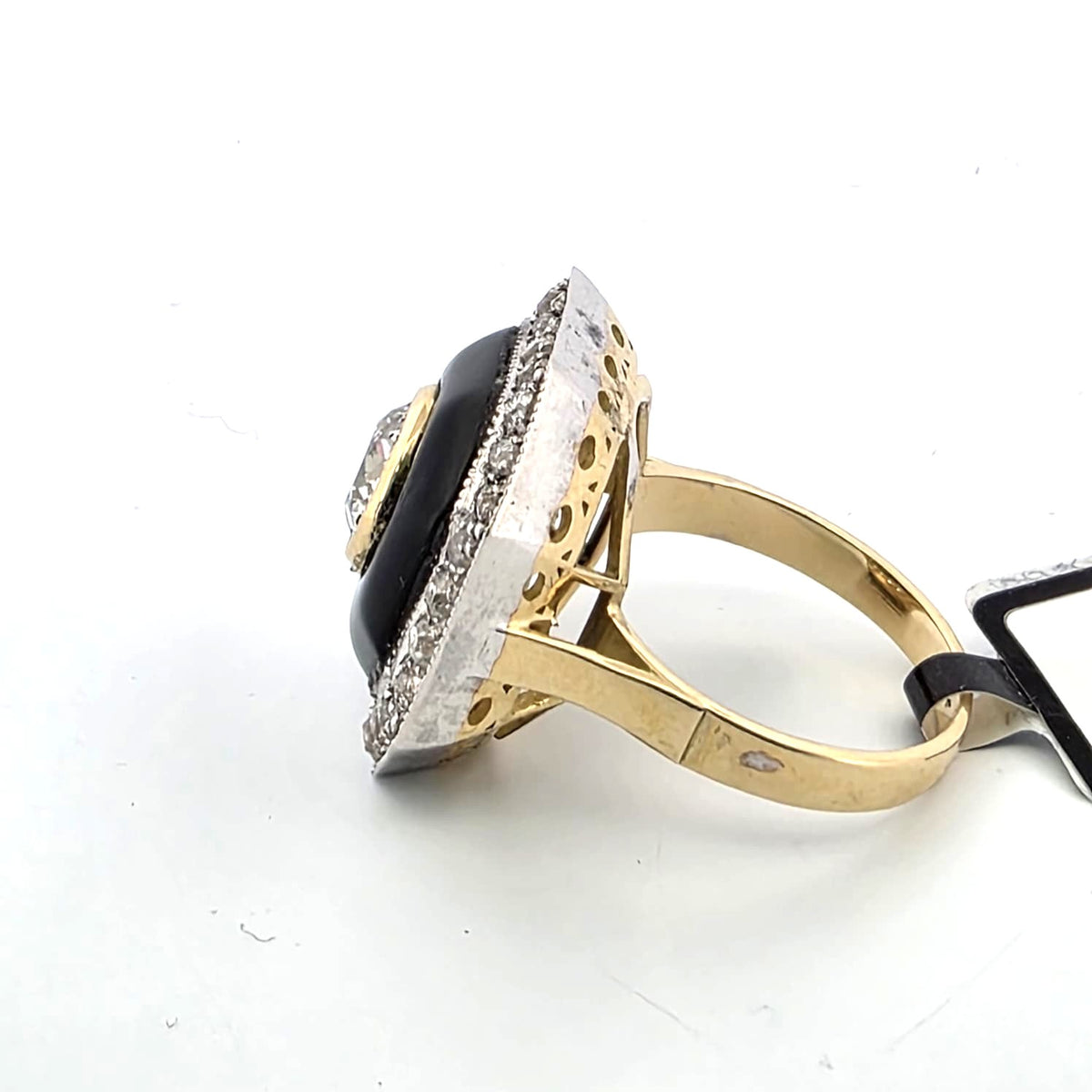 Entourage Ring in white gold, yellow gold, and diamonds
