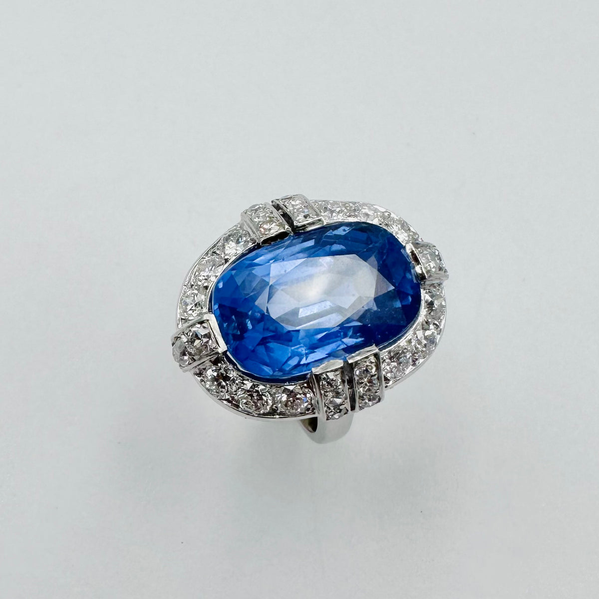 Entourage Ring in platinum, sapphire, and diamonds