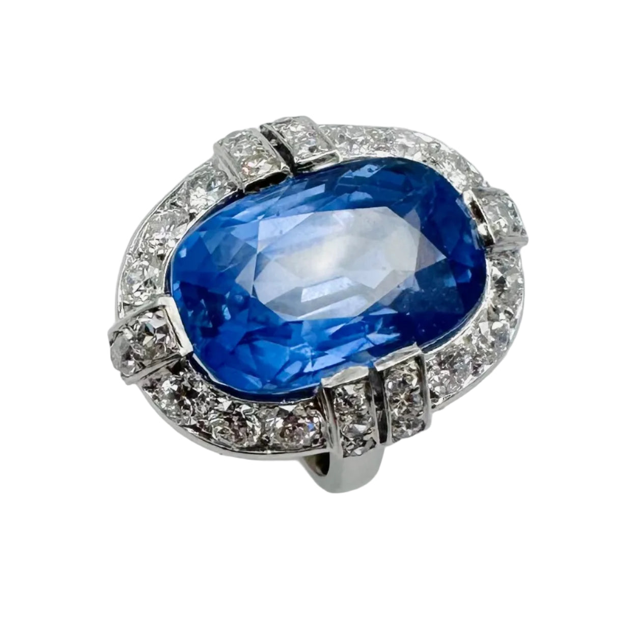 Entourage Ring in Platinum, Sapphire, and Diamonds