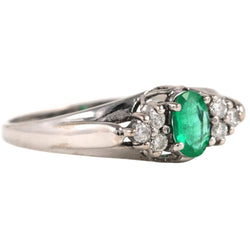 Trilogy Ring in White Gold, Emerald, and Diamonds