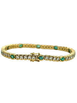 "Ligne" Bracelet in Yellow Gold, Emeralds, and Diamonds