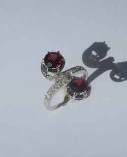 "Toi et Moi" Ring with 19th-Century Swirls, Garnets, Diamonds, and Platinum