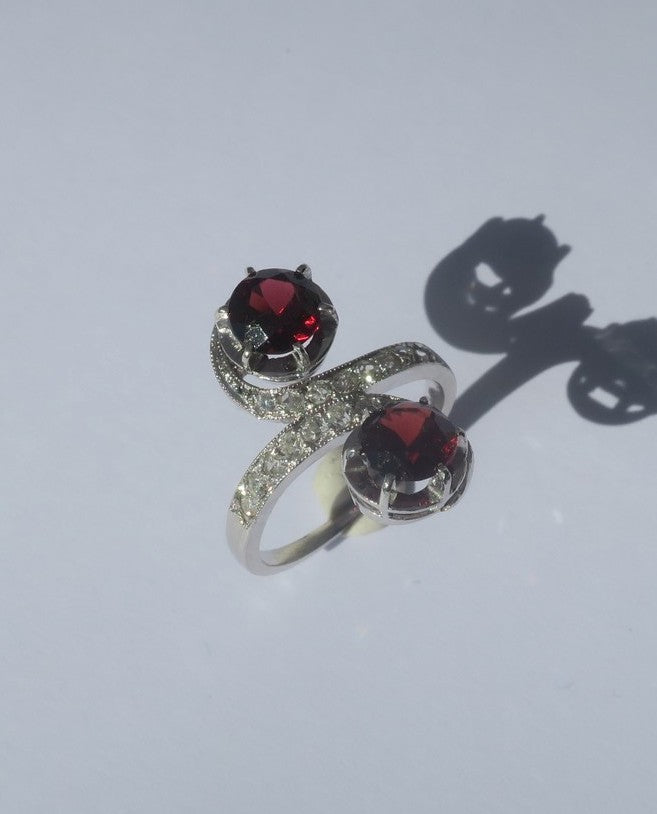 "Toi et Moi" Ring with 19th-Century Swirls, Garnets, Diamonds, and Platinum