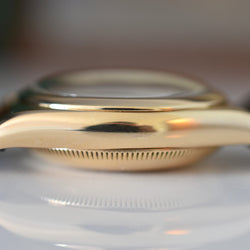 ROLEX "Oyster Perpetual Bubbleback Ovetto" watch in yellow gold and leather