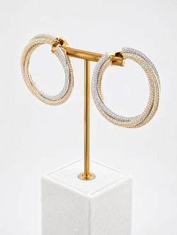 CARTIER "Trinity" Clip-On Earrings in white gold, yellow gold, rose gold, and diamonds