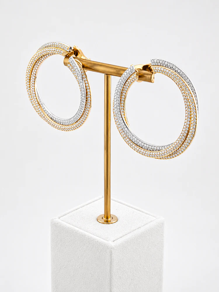 CARTIER "Trinity" Clip-On Earrings in white gold, yellow gold, rose gold, and diamonds