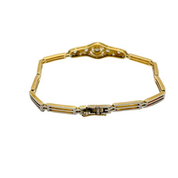 White gold, yellow gold, and diamond bracelet