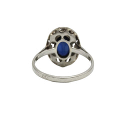 Entourage Ring in white gold, platinum, sapphire, and diamonds