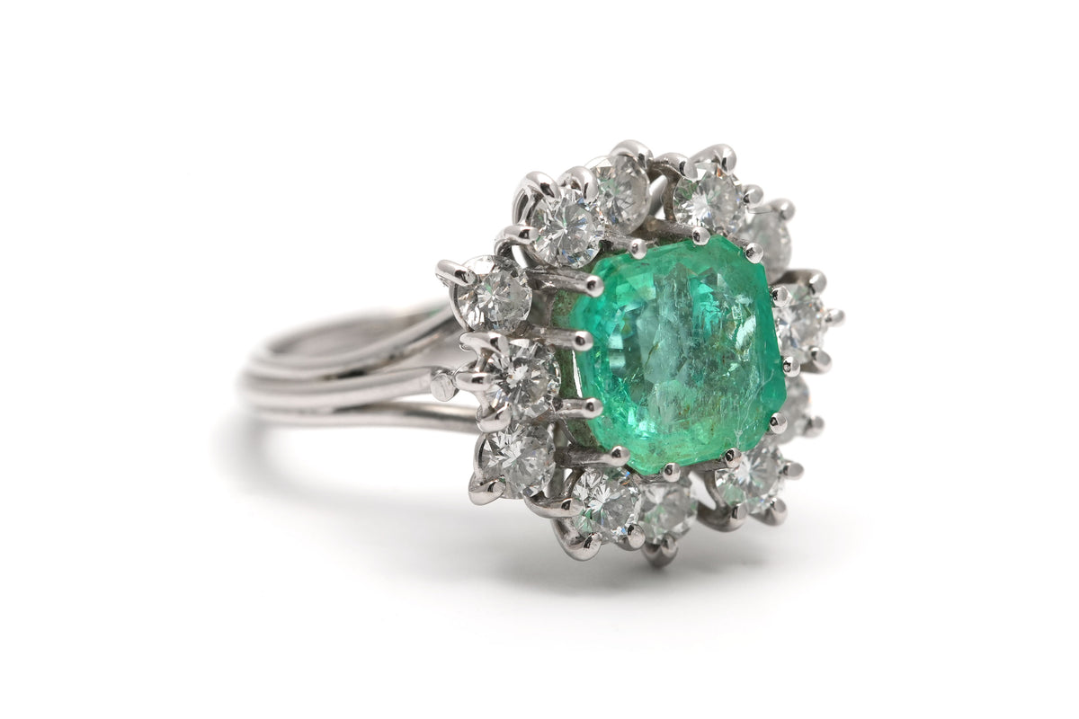 "Entourage" Ring in White Gold, Emerald, and Diamonds