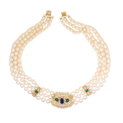 REPOSSI set in yellow gold, with pearls, sapphires, emeralds, and diamonds