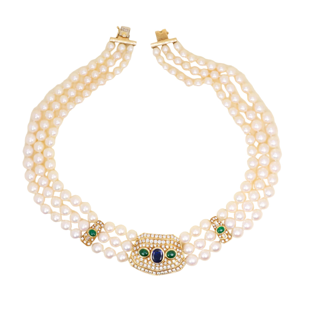 REPOSSI set in yellow gold, with pearls, sapphires, emeralds, and diamonds
