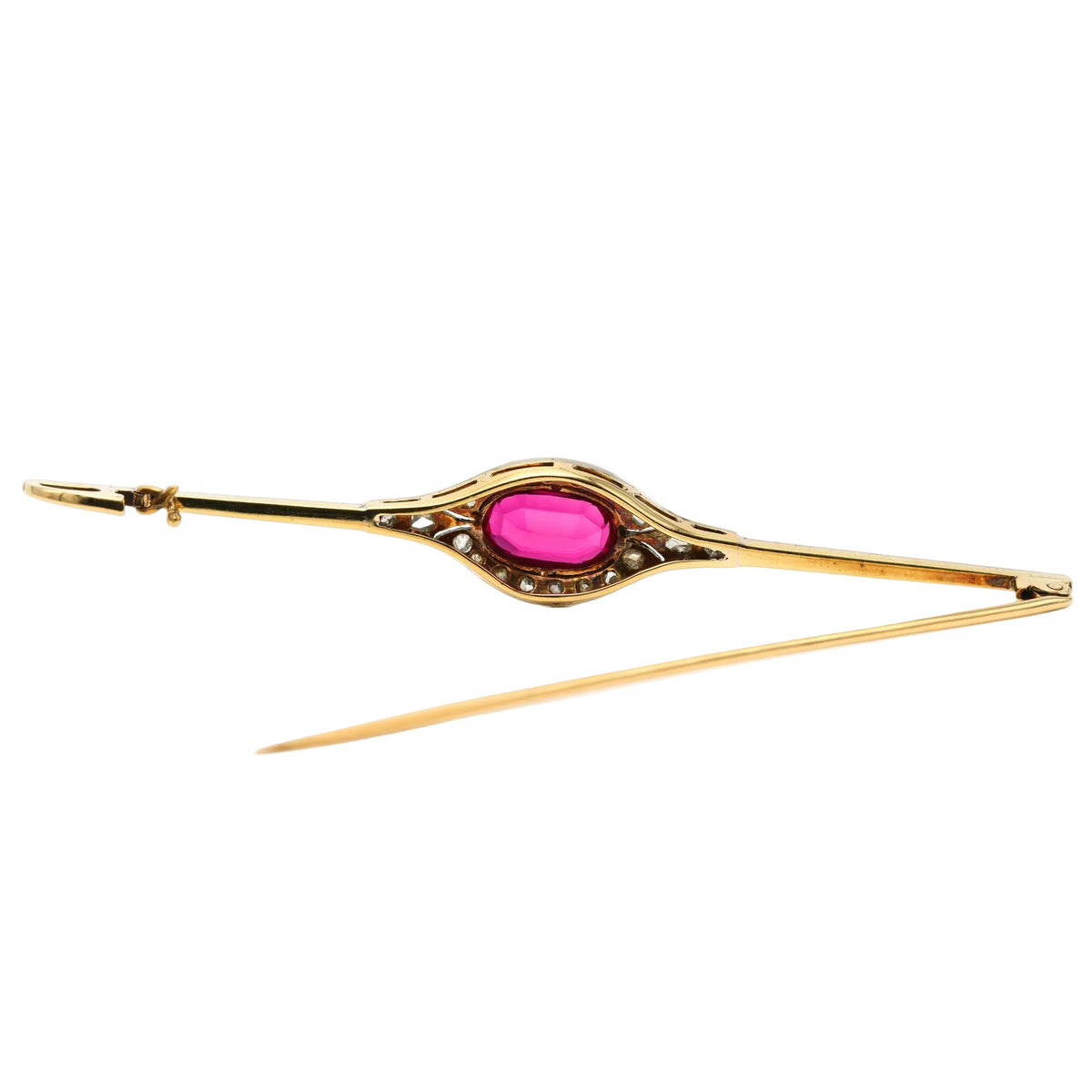 Brooch made of white gold, yellow gold, rubies, and diamonds