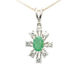 White gold pendant with emeralds and diamonds