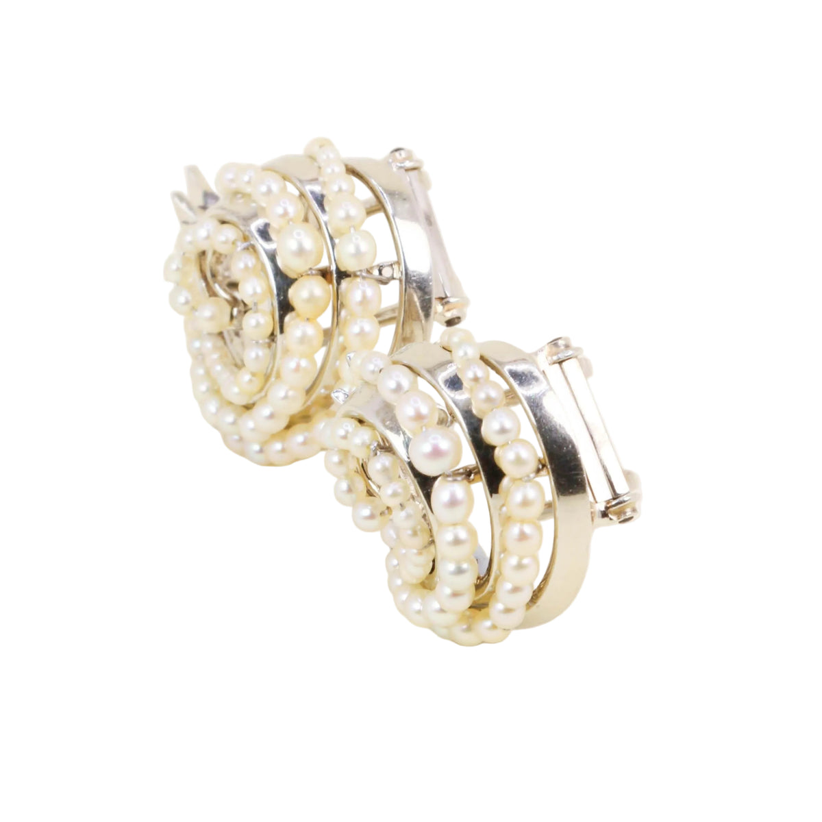 White Gold and Pearl Brooches