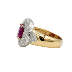 Entourage Ring in white gold, yellow gold, rubies, and diamonds