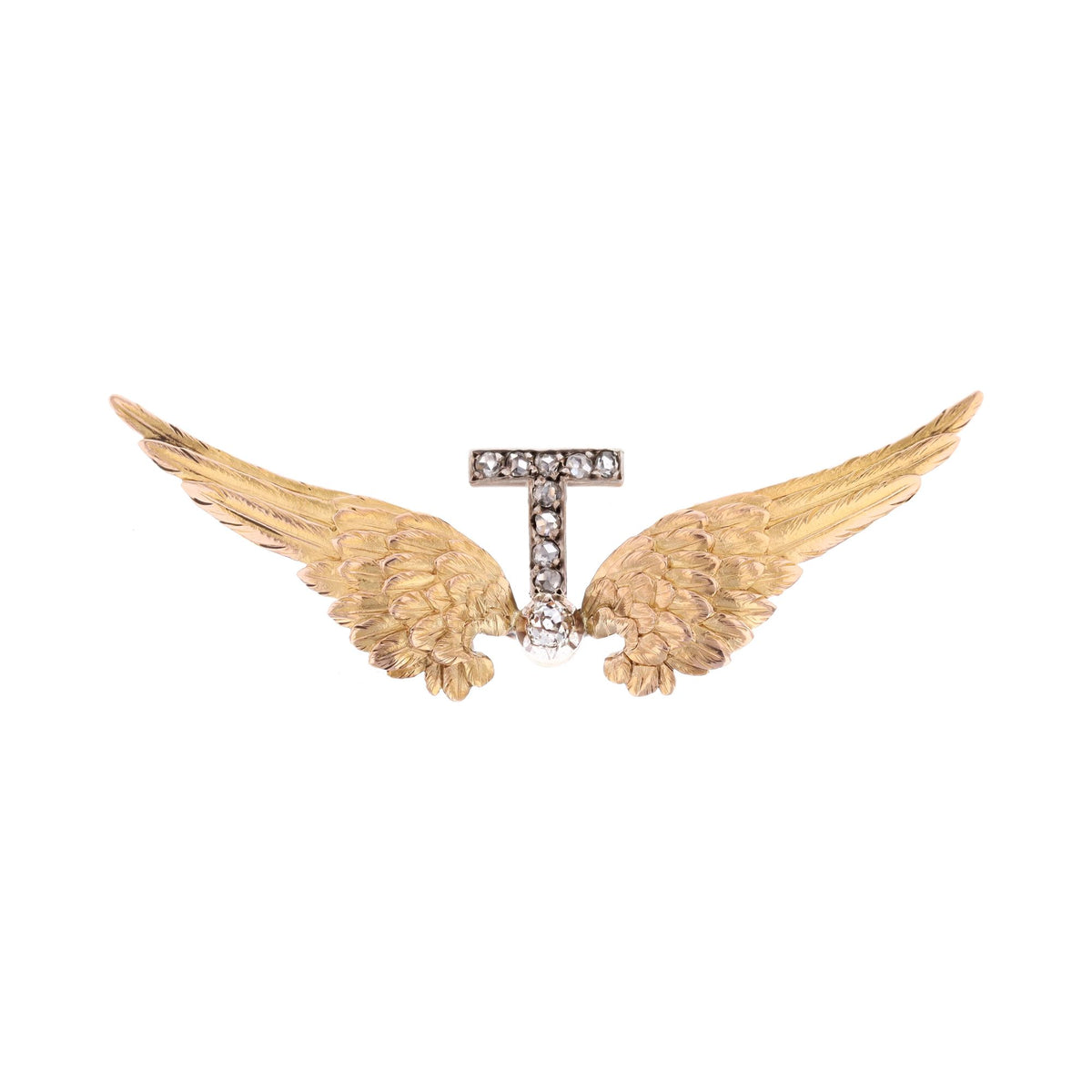 Yellow gold, silver, and diamond brooch
