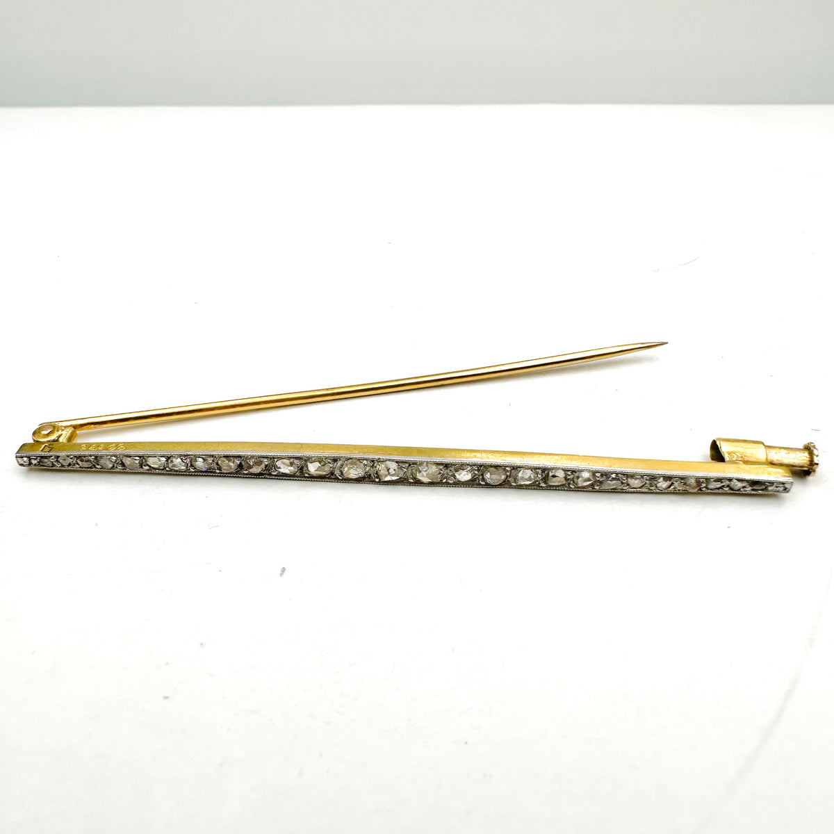 Art Deco Brooch in Yellow Gold, Platinum, and Diamonds